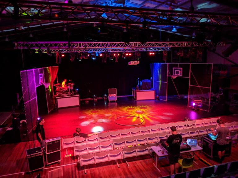 colourful stage lighting and sound equipment set up